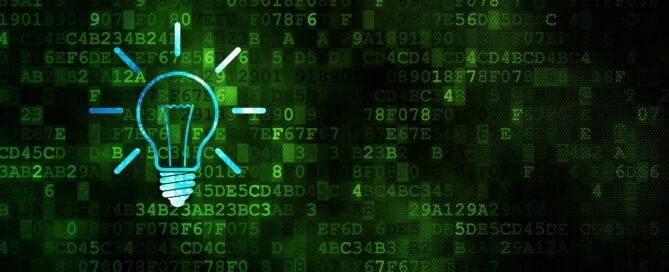 Green tech background with illuminated lightbulb symbolizing a proactive IT support company.